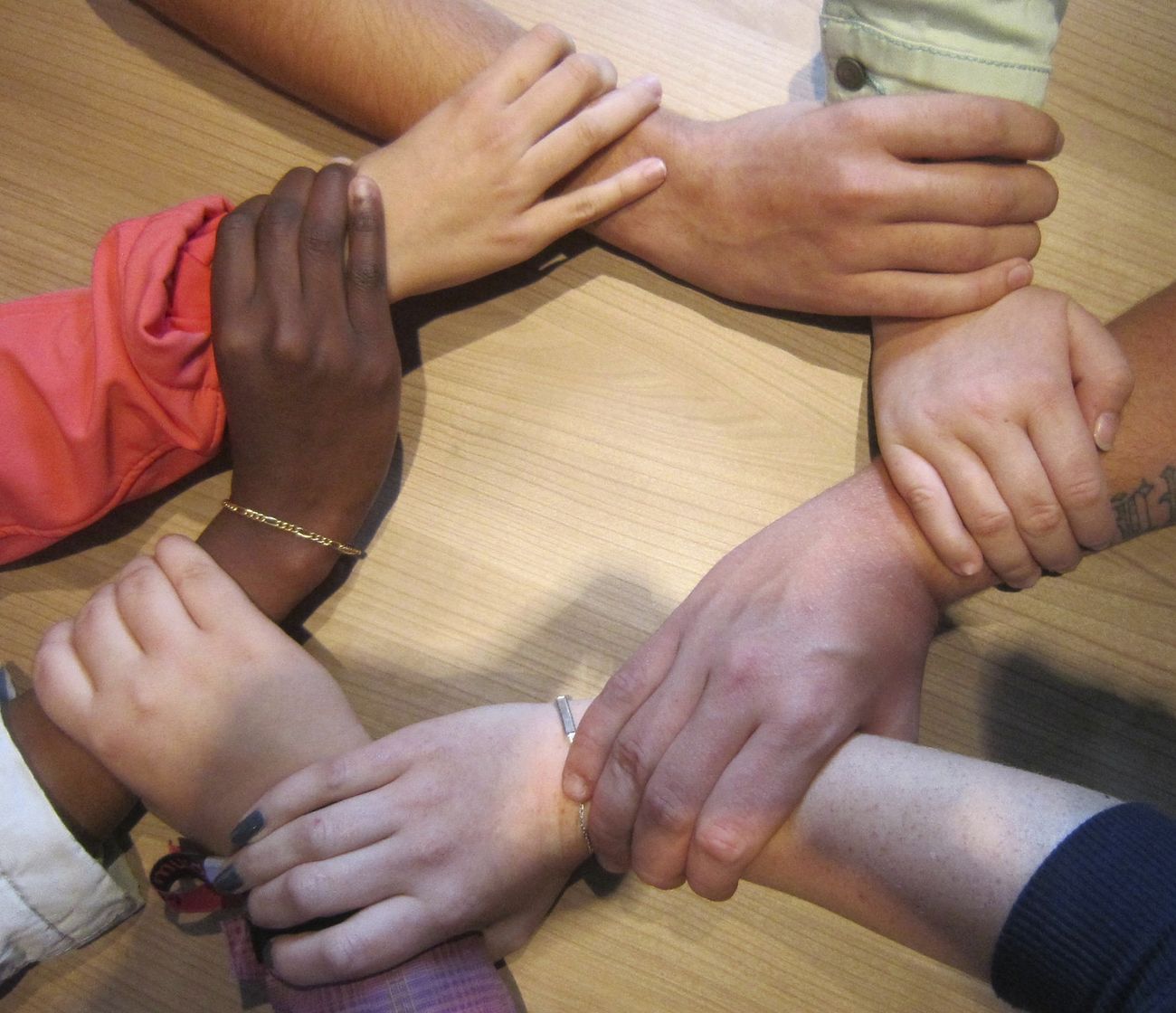 Free people joining hands image